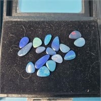 Assorted Opalescent Gemstones with Display Cases