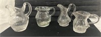 (4) Miniature Colorless Pitchers/Creamers