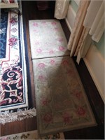 2 smaller rugs