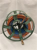 200Ft Of Extension Cords On Retracting Reel.