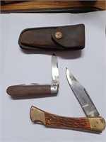 Two Pocket Knives and One Case