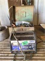 Fence charger + circular saw in metal box