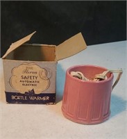 Vintage pink bottle warmer