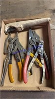 Snap ring pliers and a hose cutter