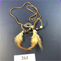 Neckless with feathers on leather  see photo 26-J