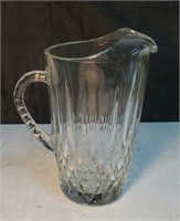 Heavy glass pitcher approx 9 inches tall