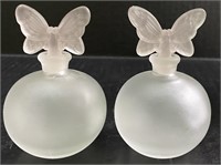 2 PINK PERFUME BOTTLES WITH BUTTERFLY LIDS