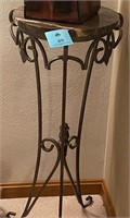 Wrought iron plant stand with marble top