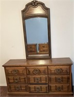 Large dresser with mirror and desk chair