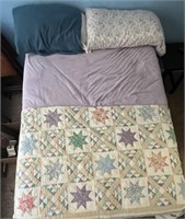 Queen size bed, with pillows, sheets,
 quilts