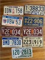 License Plates : New York, South Dakota,