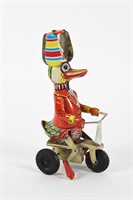 COLORFUL DUCK ON TRICYCLE TIN LITHO WIND-UP TOY