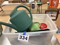 Tote of jars, watering cans, painting supplies