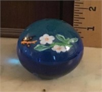 Round blue glass paperweight