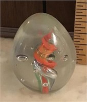 Egg-shaped glass paperweight