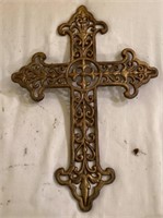 Medieval-style metal cross painted gold