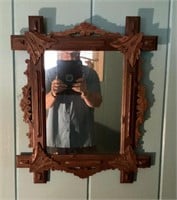 Early carved walnut mirror
