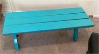 Wooden bench painted blue