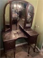 Vanity with trifold mirror