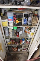 Metal cupboard with contents