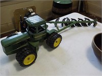 John deer toy tractor and plow