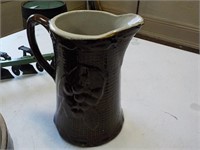 Brownware pitcher 8" tall