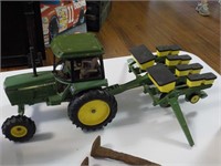 John Deer toy tractor and seed planter
