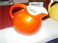 Pottery USA Orange creamer 3"