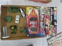 Toy farm items, race car