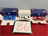 (3) 1:24 Die Cast Ford Cars