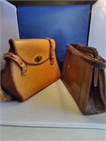 (1) Handmade cowhide handbag & (1) Vintage Palizzi