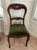 CARVED WOOD CHAIR WITH GREEN VELVET CUSHION