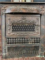 Antique cast-iron fireplace stove door