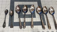 Group of 8 silver spoons