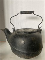 Antique cast-iron star lid 8 kettle