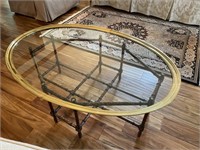 Brass rimmed glass coffee table