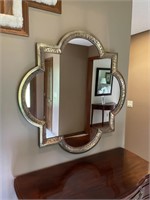 Metal-framed wall mirror