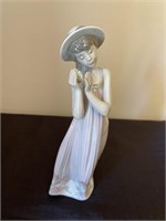 Lladro girl with flower