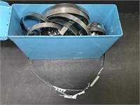 Metal box with a variety of metal band clamps.