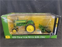 John Deere 420 tractor with KBL Disc, Precision