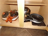 Pots, Pans, some lids (lower cabinet)
