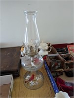 Oil lamp with cardinal paint theme