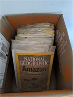Box of vintage National Geographic magazines.
