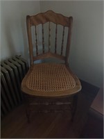 Single mid-century maple cane seat chair