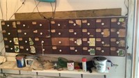 Old seed cabinet with contents including 32