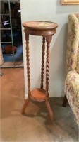 Plant stand, top is 12” round, height is 39-1/2”
