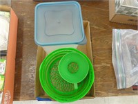 small plastic container and pieces