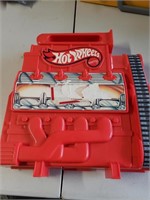 Assorted Hot  Wheels in Racers Engine Case
