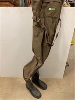 Hip waders size tall.