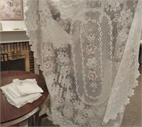 Hand stitched linens and lace tablecloth